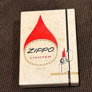 Zippo 1950s, brand new, never used. Lighter Box with Champion Design